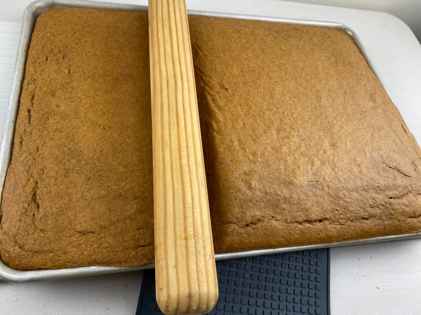 Bake in preheated  350° oven for ~25 minutes, test for doneness with a toothpick. Immediately roll the bars to flatten them.